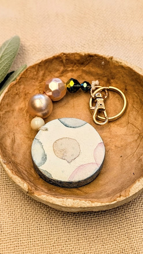 Gold beaded keyring with watercolour flowers