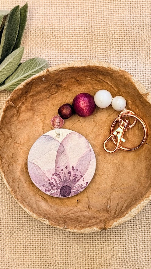 purple beaded keyring with watercolour flowers