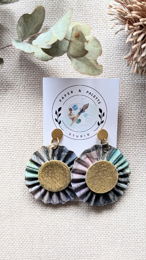 Pleated statement earrings made from hand-painted watercolour paper with a gold centre. Lightweight, artistic, and eco-friendly. Mariposa Collection.