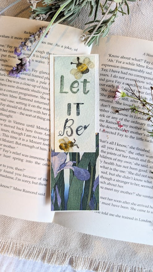 Hand-painted bookmark with a bee illustration, textured paper collage, and the words “Let It Be,” sustainably made.