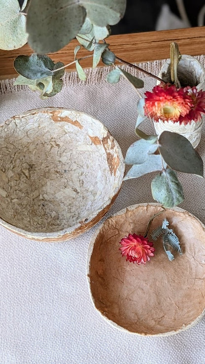 Organic paper dish in neutral decor with flowers