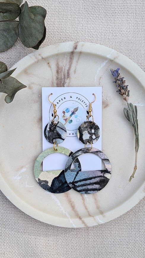 Layered dangle earrings made from hand-painted watercolour paper. Lightweight, eco-friendly, and one-of-a-kind. Part of the Mariposa Collection.